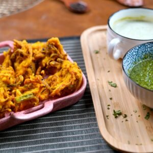 Traditional Desi Pakora with Mint and Green Sauces- Popular Pakistani Snack