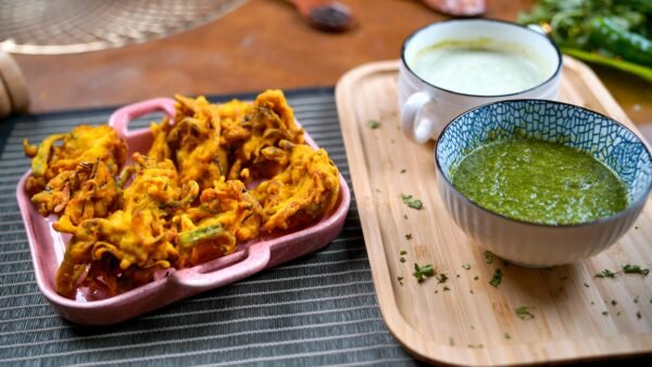 Traditional Desi Pakora with Mint and Green Sauces- Popular Pakistani Snack